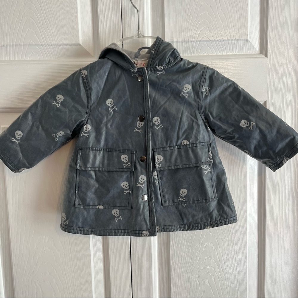 Amy Coe skull and crossbones raincoat. Size 12 months